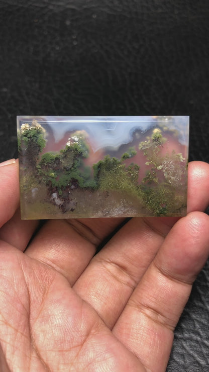 "Scenic Moss Agate cabochon with intricate underwater landscape patterns - measures 52.5 x 32 x 5mm.